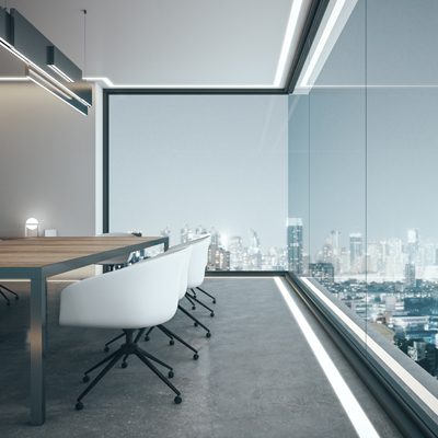 Contemporary meeting room interior with illuminated panoramic city view. 3D Rendering